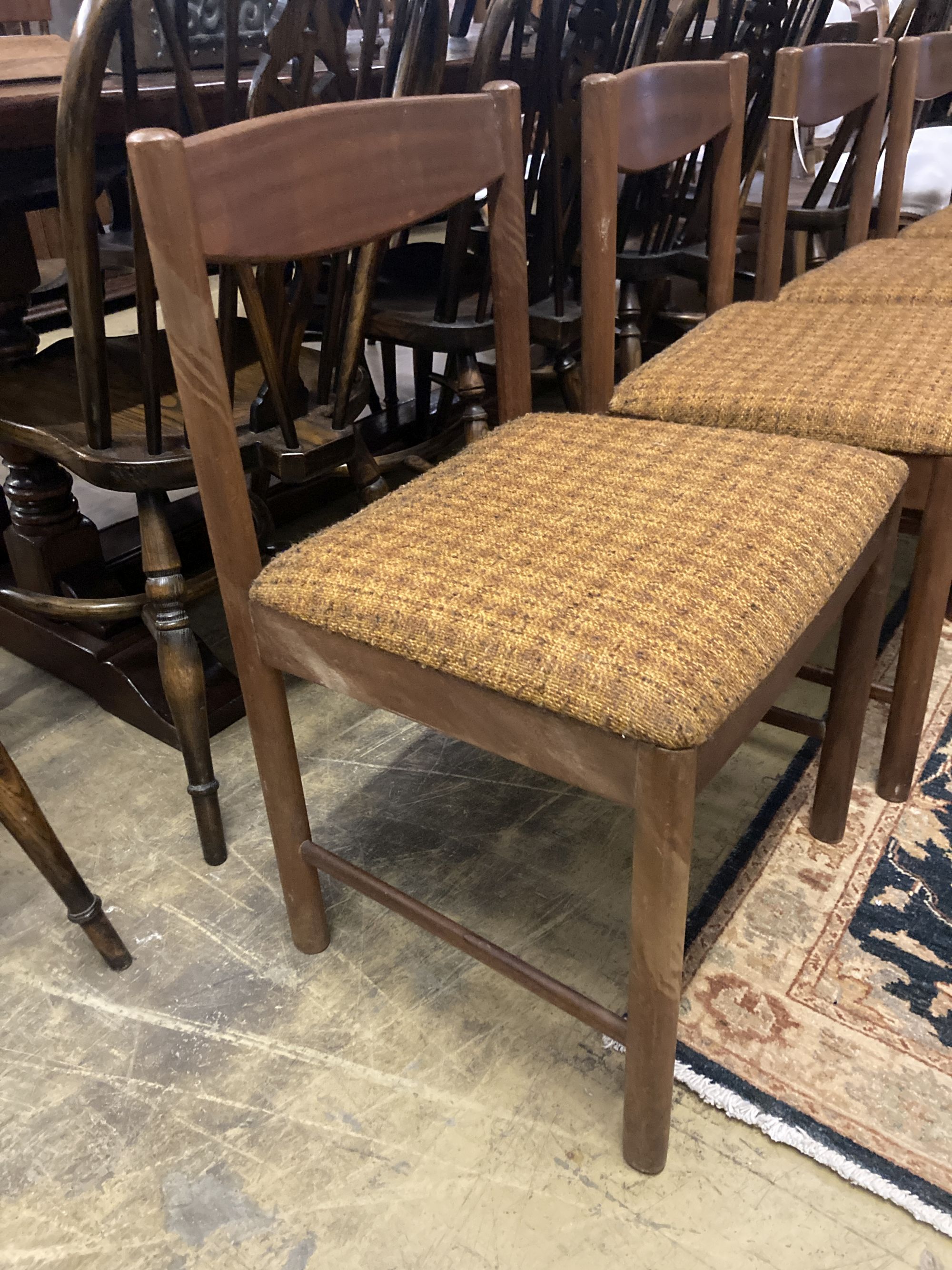 A set of four mid century Macintosh teak dining chairs, model 4003